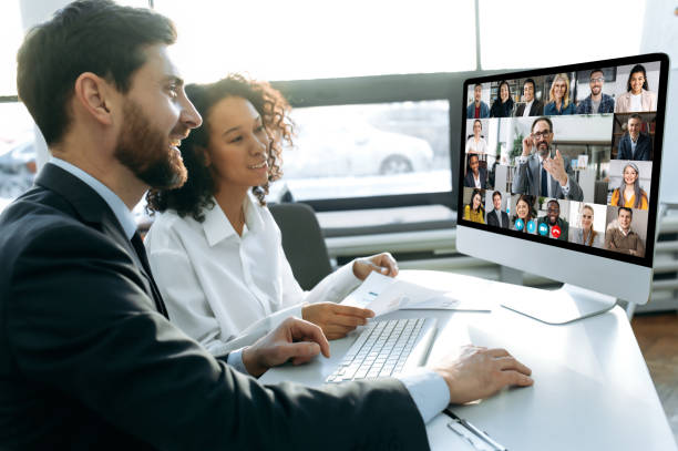 Insurance agents working together to process an insurance application