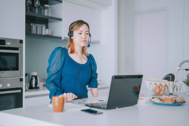 Image of female remote insurance agent ready to connect with clients from her home office.