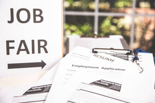 Image of Resumes piled up, Intended to show a high demand for Health Insurance Agent positions with new opportunities.