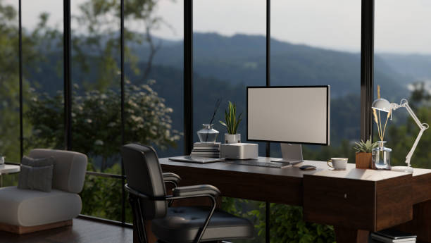 Remote work from home office with a view of trees and a cloudy sky