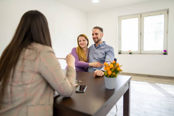 Recruitment panel interviewing potential insurance agent candidate.