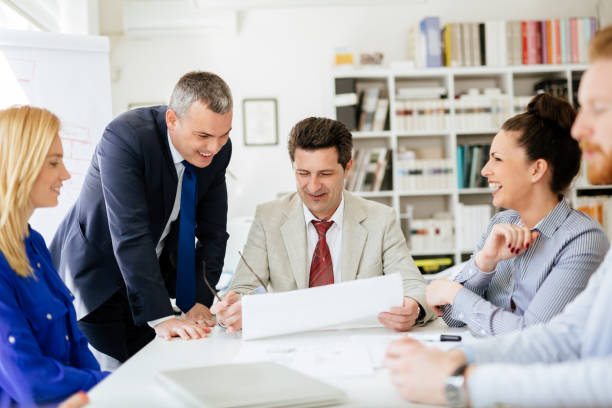 Independent insurance agent team working in an office.