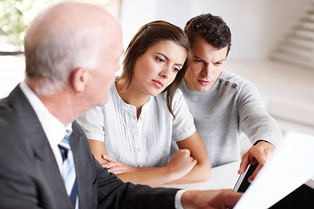 Insurance agent presenting to a customer.