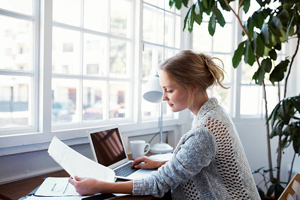 Woman working remotely from her cozy workspace