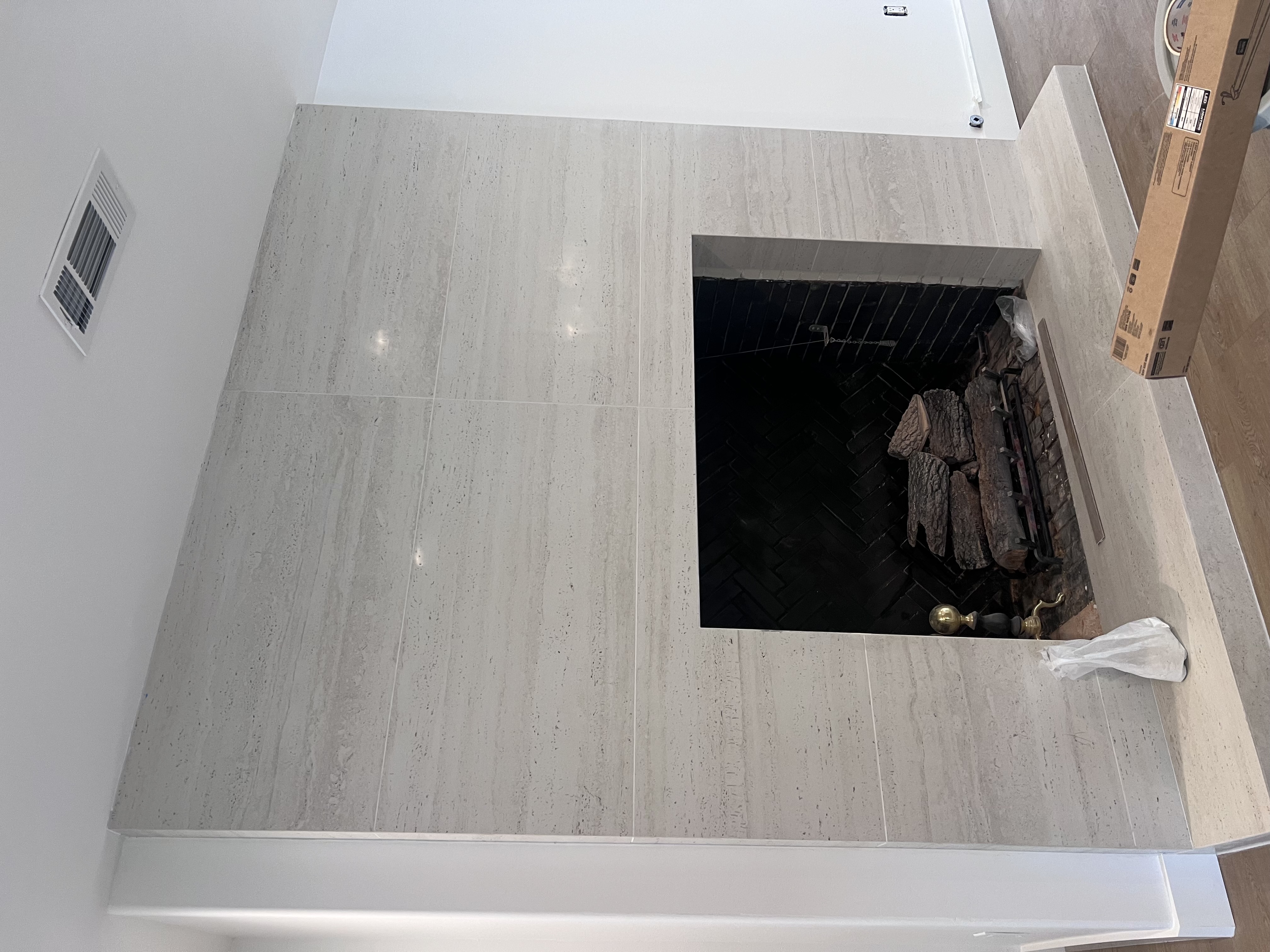 Stone-Tile Fireplace Installation