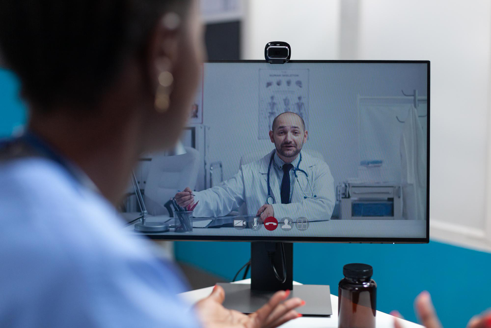 Doctor conducting a telehealth visit Doctor conducting a telehealth visit