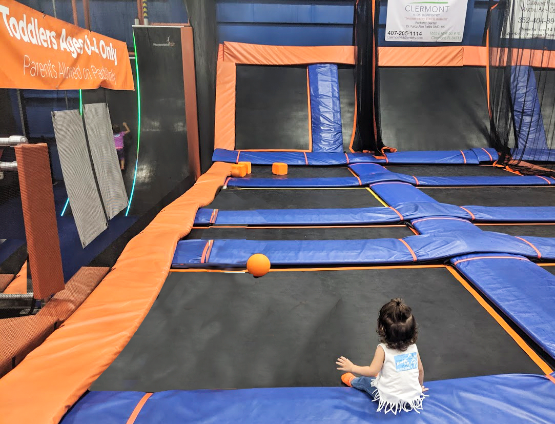 A toddler in the trampoline area at Sky Zone A toddler in the trampoline area at Sky Zone