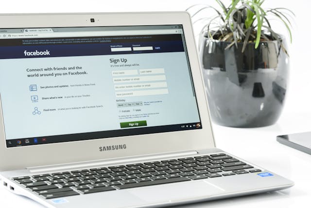 Facebook page on a laptop screen Facebook page on a laptop screen