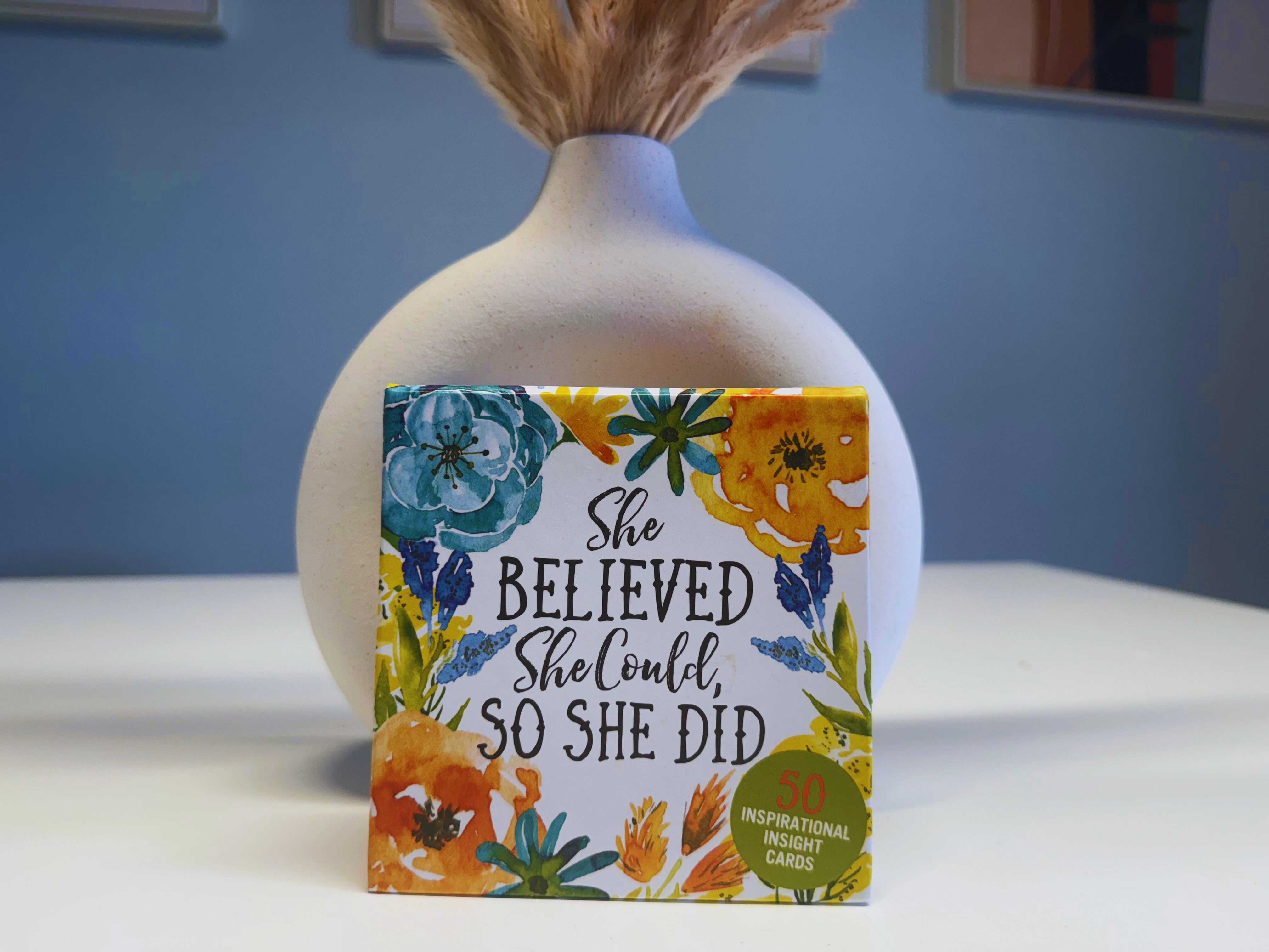 Positive quote box on a table Positive quote box on a table