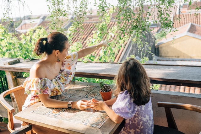 Mom and daughter at a restaurant