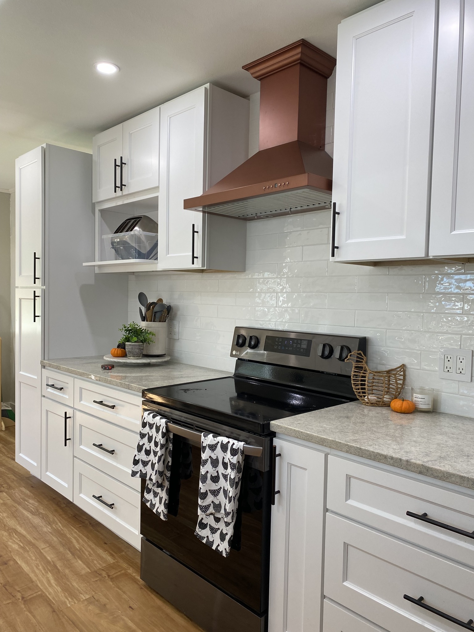 Freshly remodeled kitchen with modern cabinetry and stone countertops by Pro Jack Remodeling