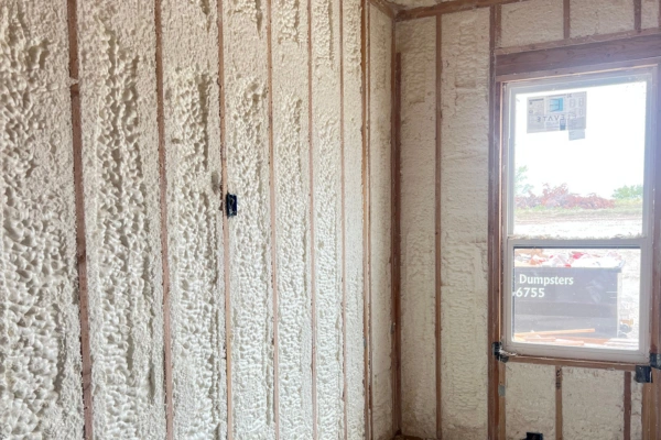 Open cell spray foam insulation applied to interior walls for improved energy efficiency and soundproofing. Open cell spray foam insulation applied to interior walls for improved energy efficiency and soundproofing.