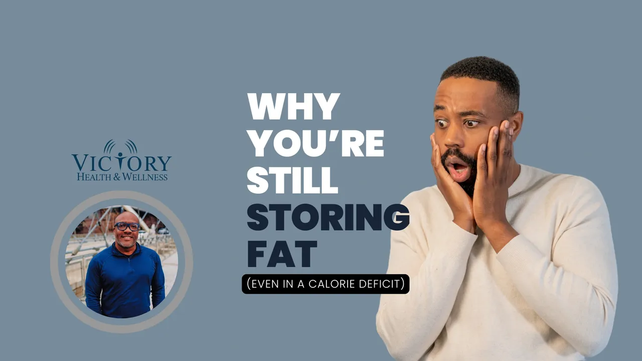 Blog header graphic showing a surprised man holding his face beside the text ‘Why You’re Still Storing Fat (Even in a Calorie Deficit)’ with the Victory Health & Wellness logo and a photo of a surprised client.