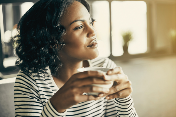 woman with coffee thinking