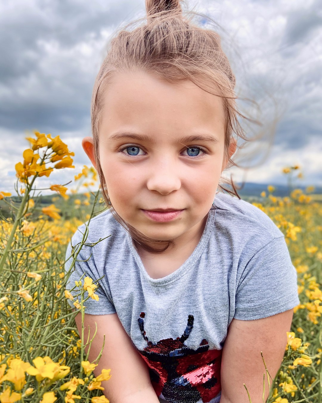 child, up close, symbolizing Jesus as the light of the world for grieving kids