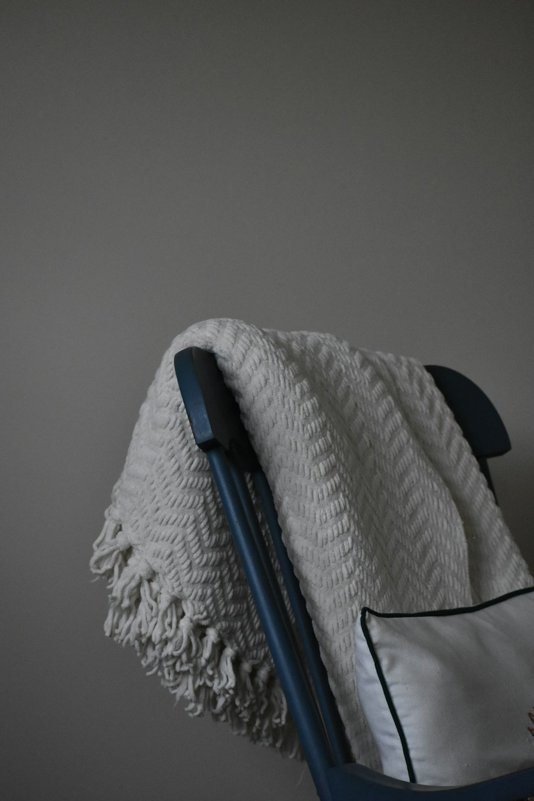 blanket draped over chair