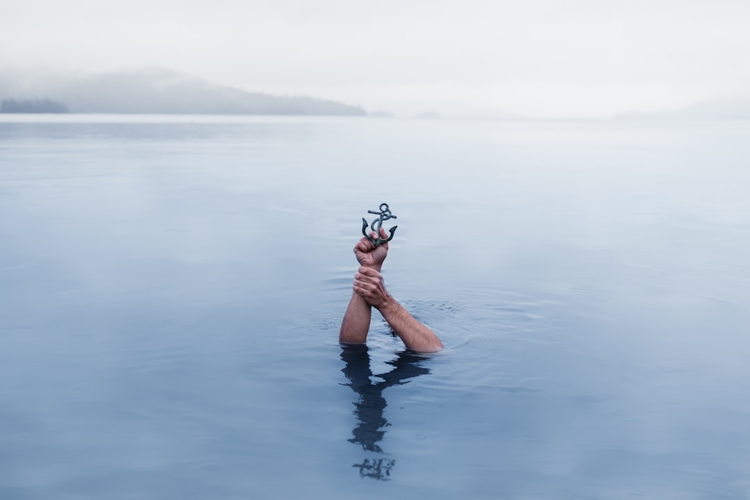 hands holding anchor