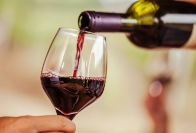 Red Wine Being poured in a glass