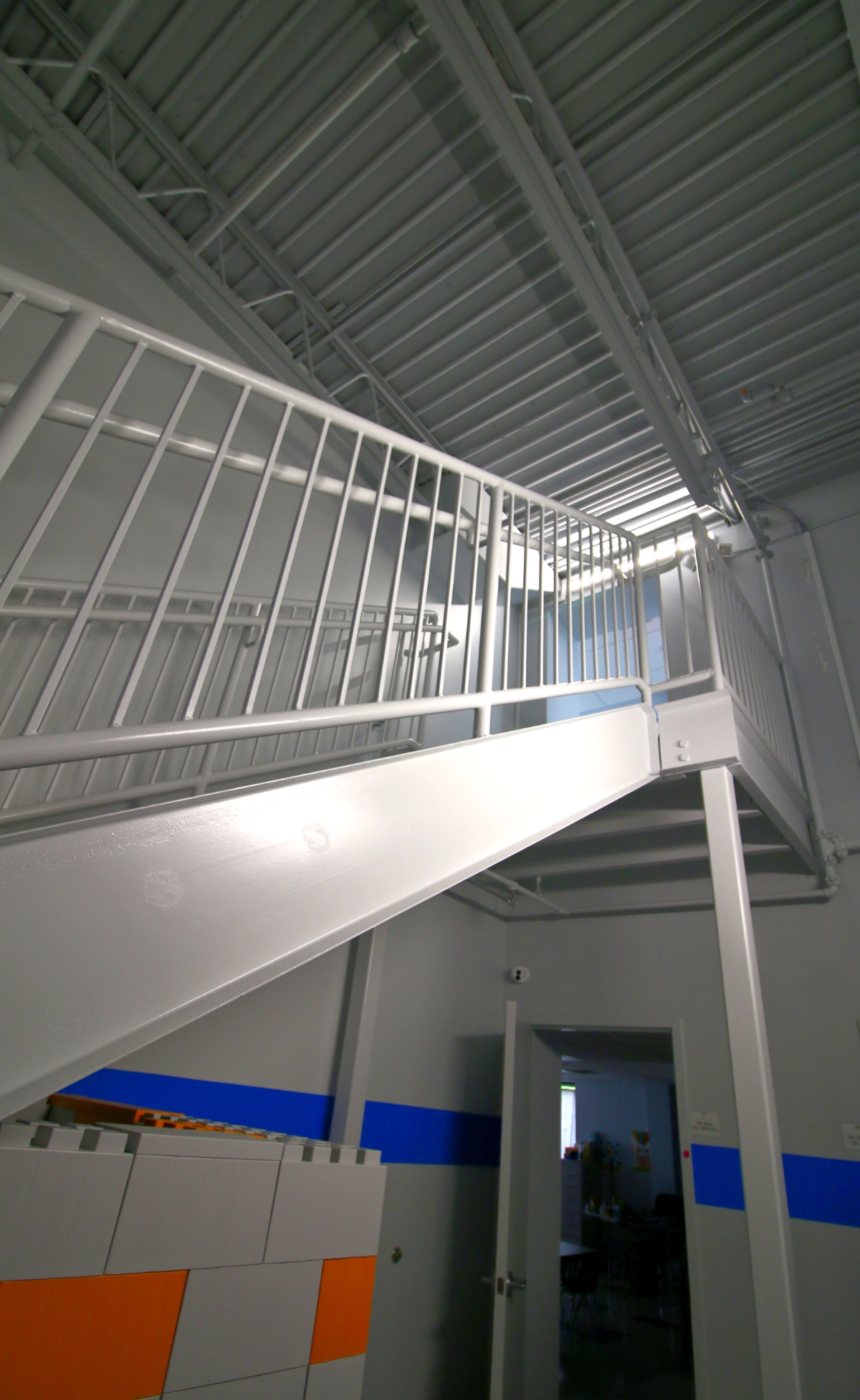 Interior staircase designed by Drake Architecture for Horizon Science Academy’s two-story addition.
