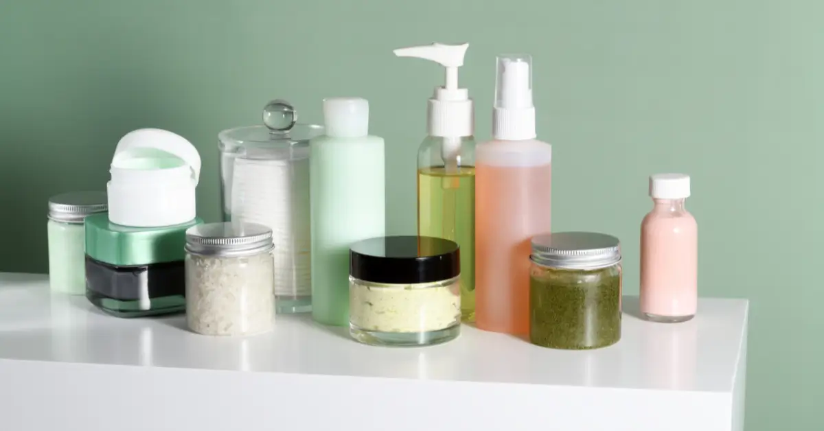 Collection of skincare products including creams, oils, and lotions arranged on a white surface Collection of skincare products including creams, oils, and lotions arranged on a white surface