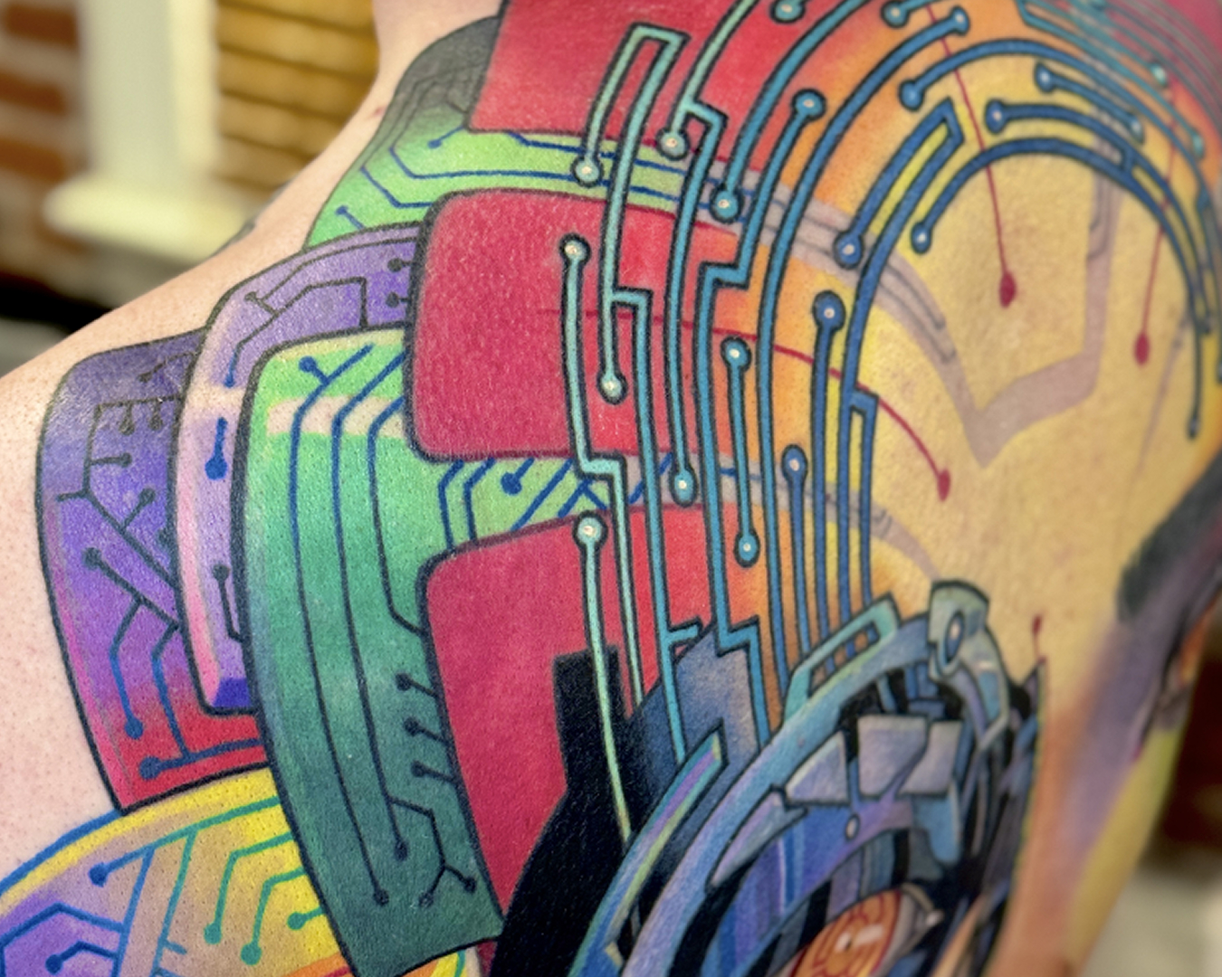 Cooper Tattoos, retro futurism backpiece, rainbow shoulder, android lady face