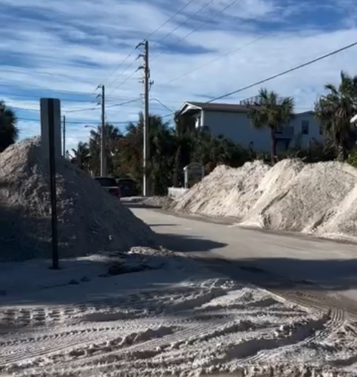 Sand covers the roads of Anna Maria Island after hurricane Milton Sand covers the roads of Anna Maria Island after hurricane Milton