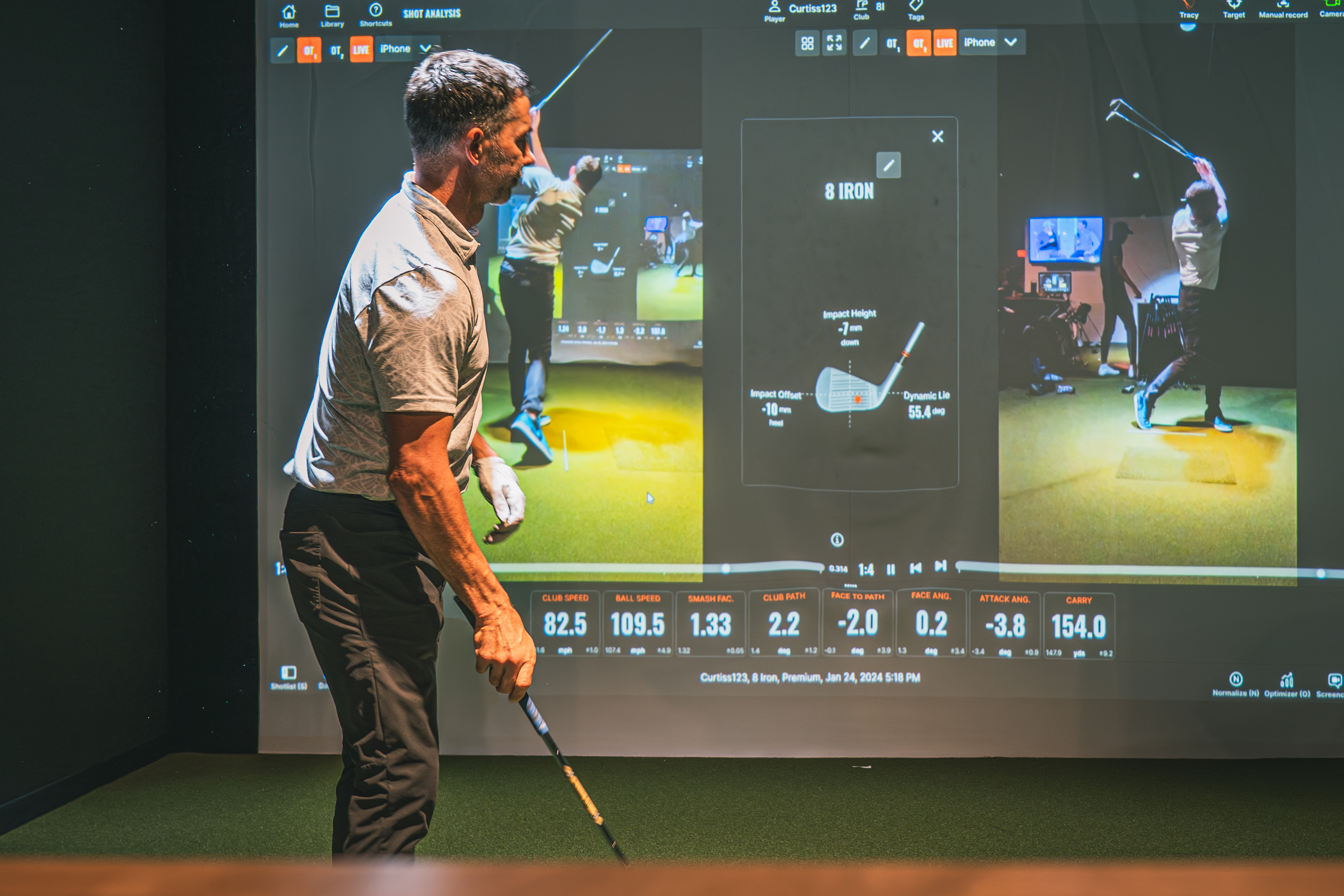 Golfer training on trackman simulator Golfer training on trackman simulator