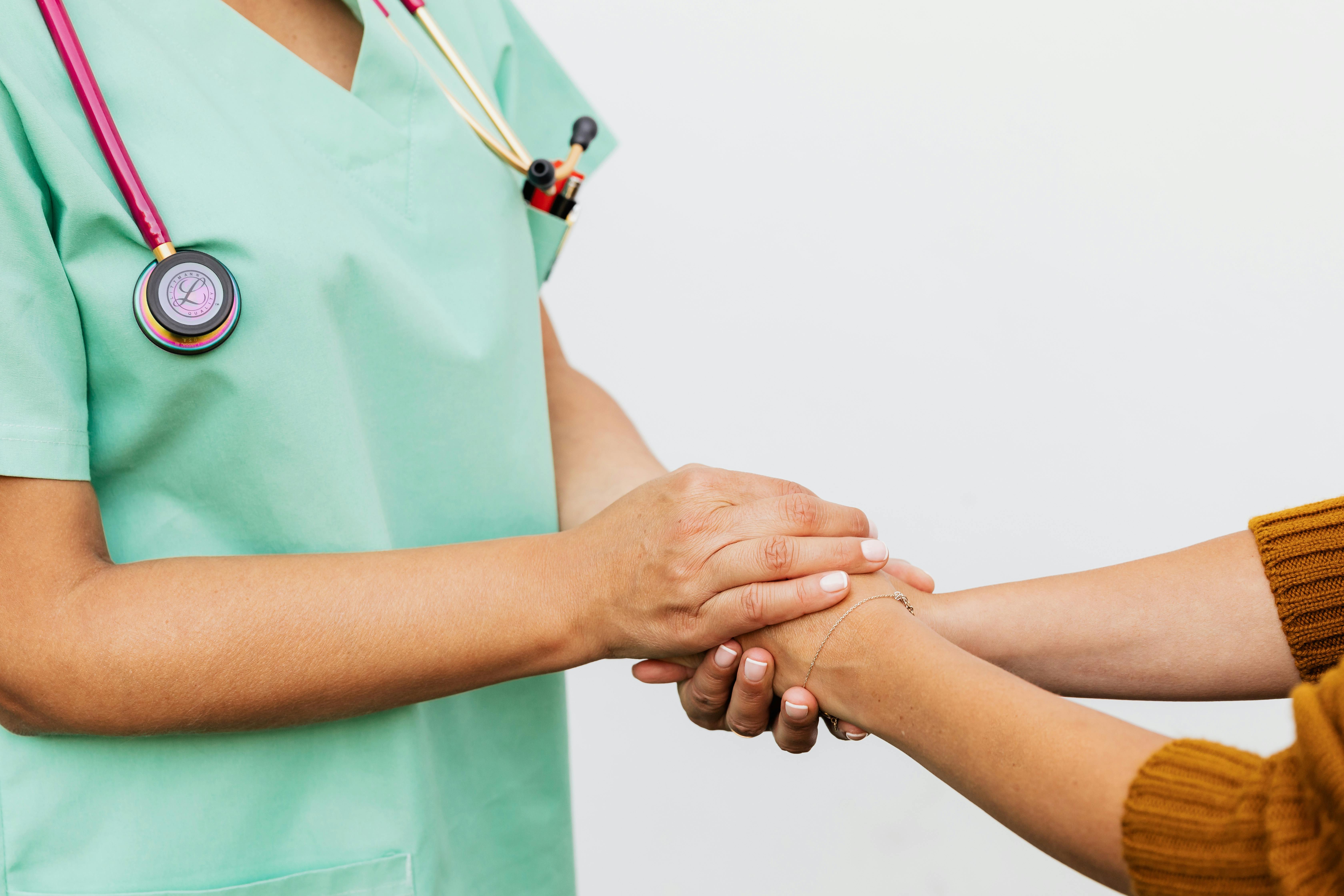 patient and doctor shakehands patient and doctor shakehands