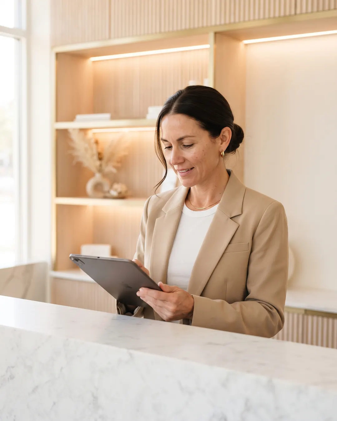 A front desk manager at reception