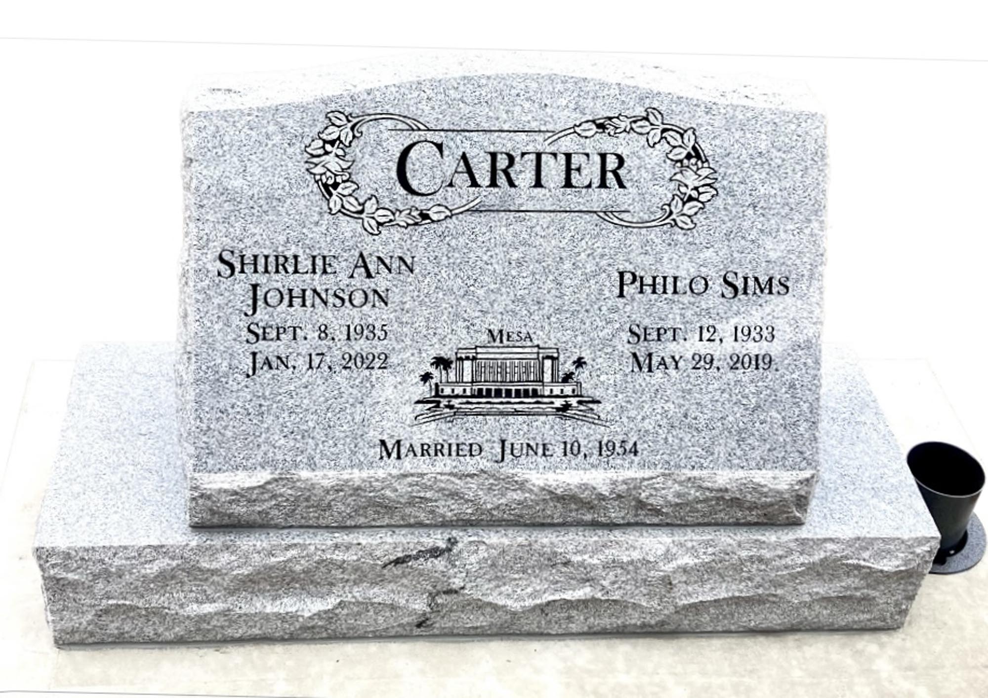 Premium black granite headstone with elegant carved lettering and memorial inscription
