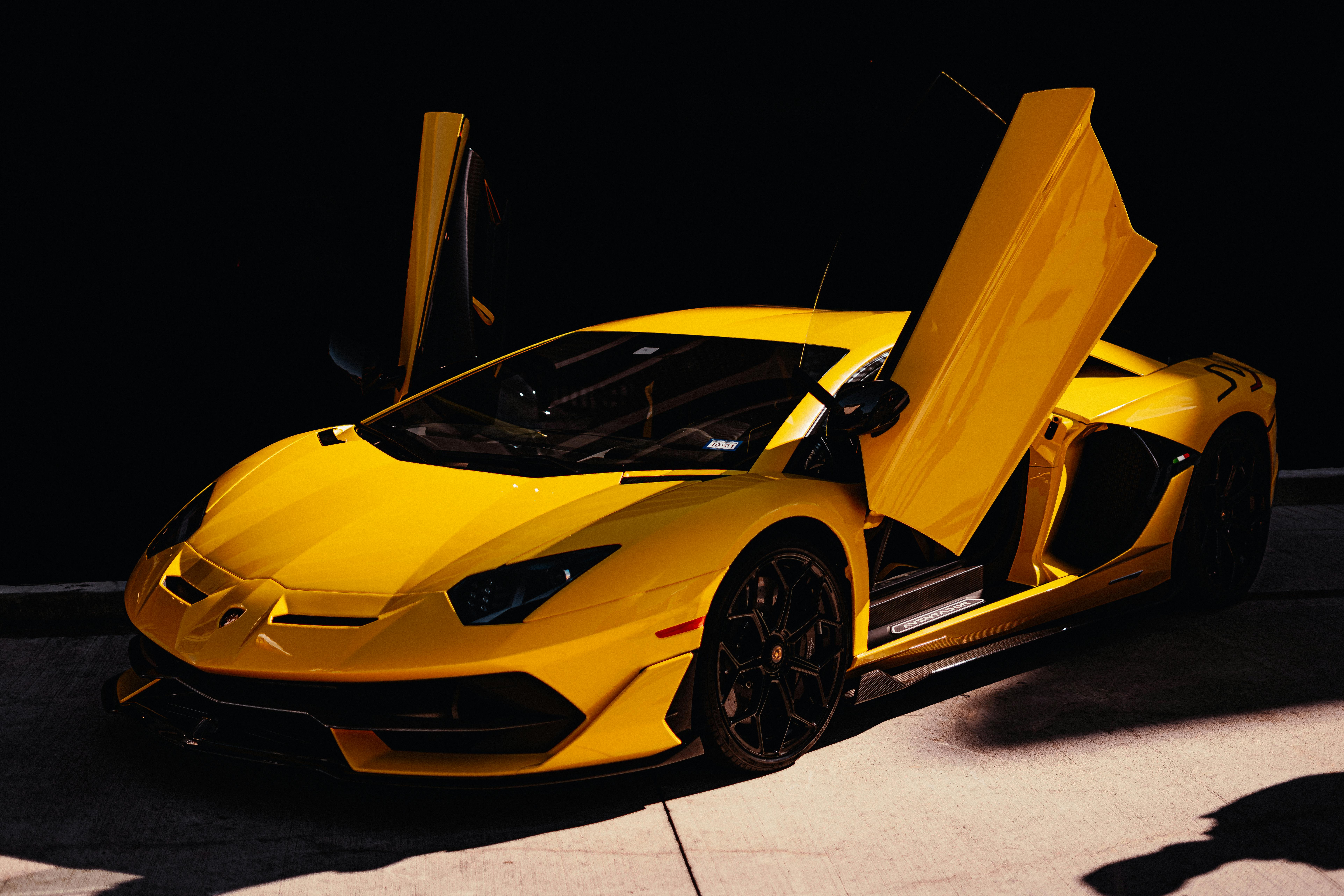 Yellow Lamborghini Aventador with mobile ceramic detailing protection in Houston