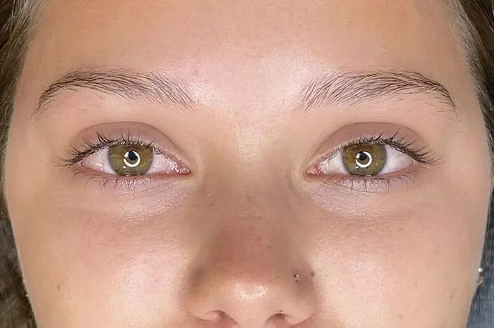 Before microblading photo showing sparse, uneven eyebrows – FH Beauty Ink Burbank