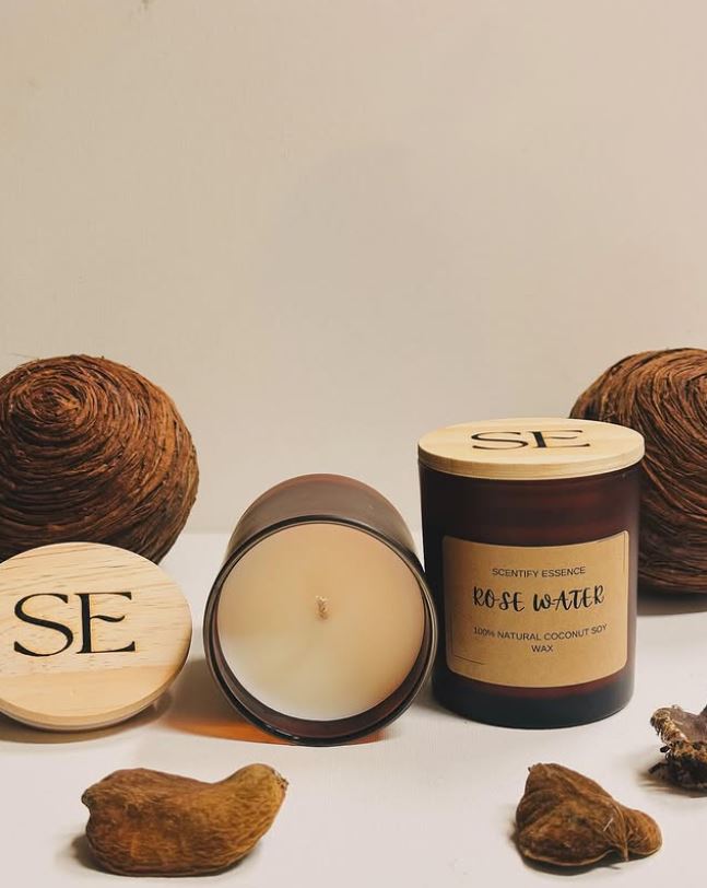 Royalty Candle by Scentify Essence displayed with elegant packaging and text that highlights its emotional and fragrant inspiration Royalty Candle by Scentify Essence displayed with elegant packaging and text that highlights its emotional and fragrant inspiration