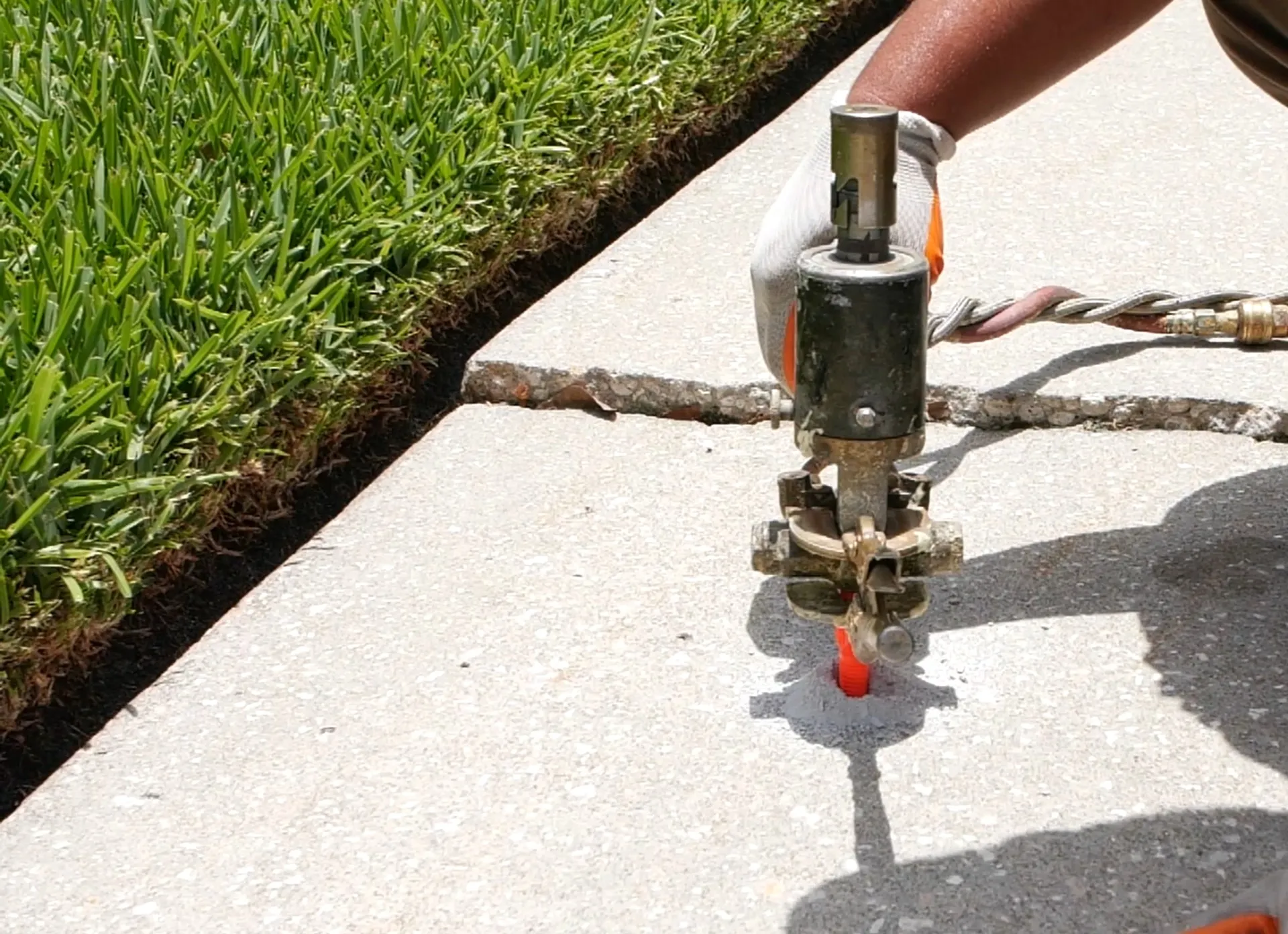 Uneven commercial concrete slabs and joints in West Valley City before leveling