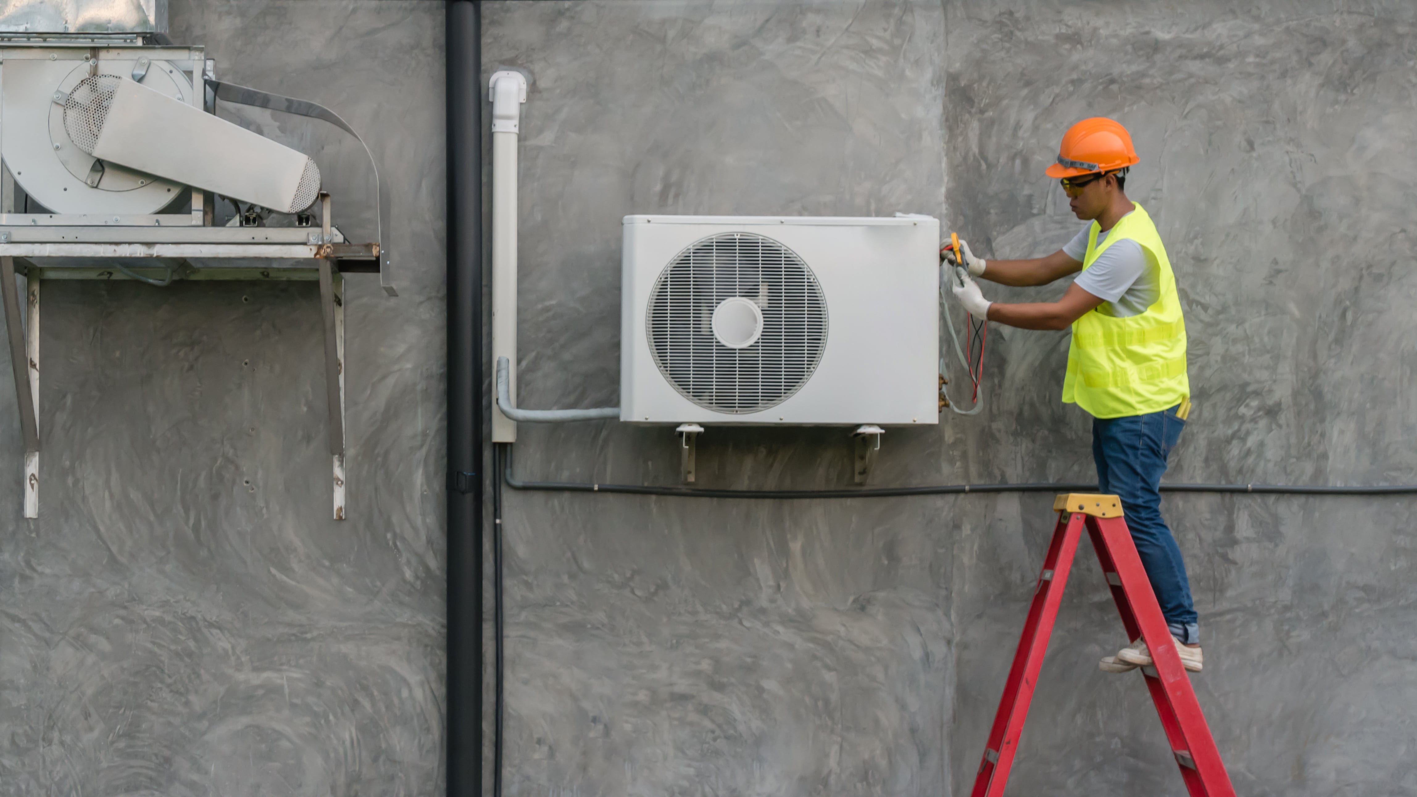 expert hvac technician installing new system