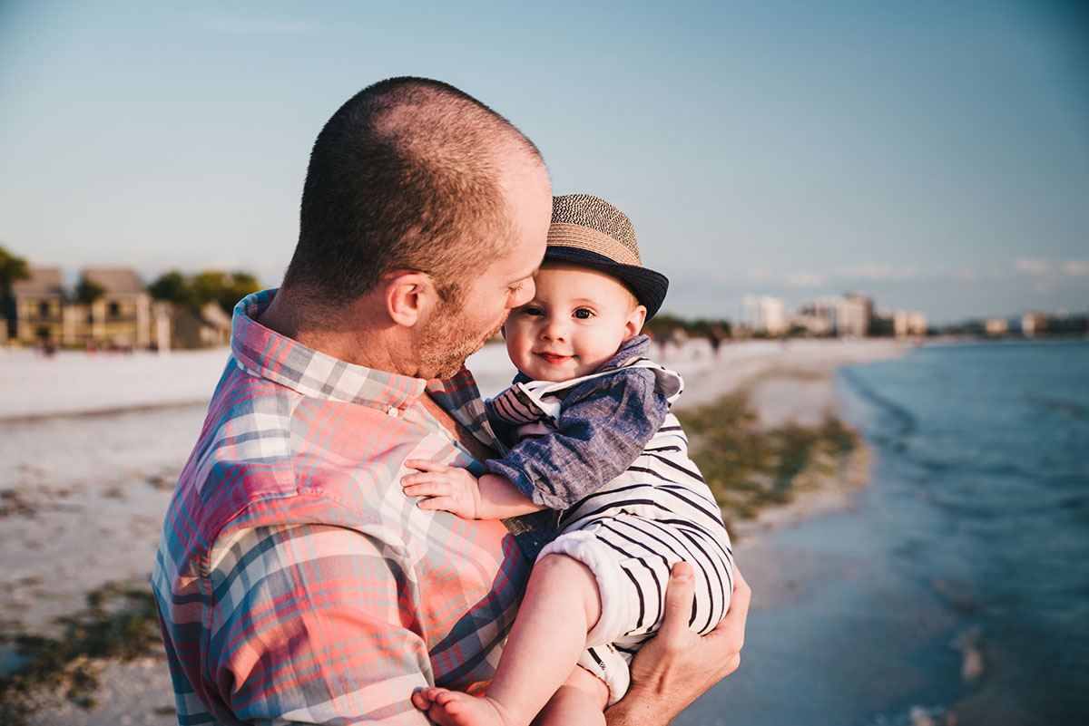 Mother and son on Fort Myers Beach. Traveling family photographer.