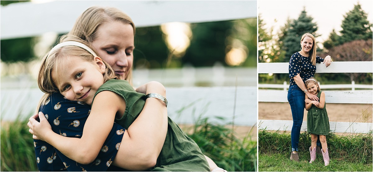 Mother and daughter hug during photoshoot.