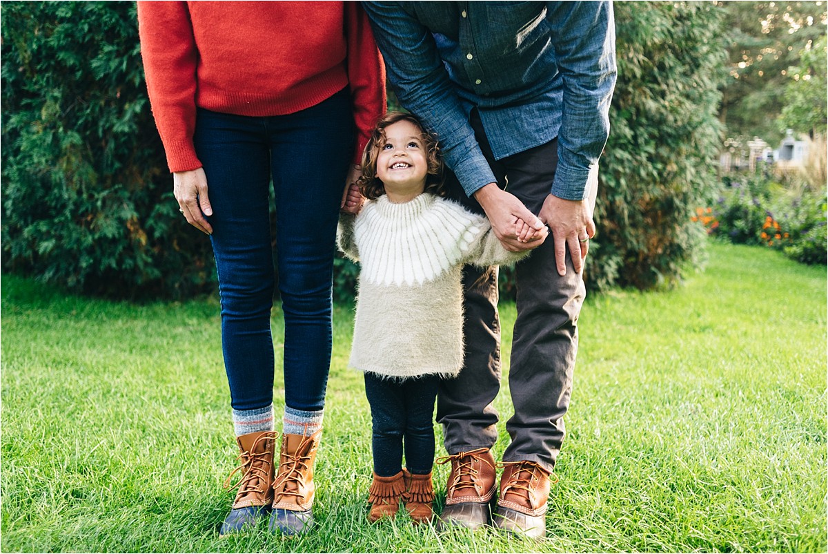 Family photos sunset session with boots and hand holds.