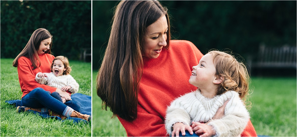 Mother and daughter laugh during a family photos sunset session.