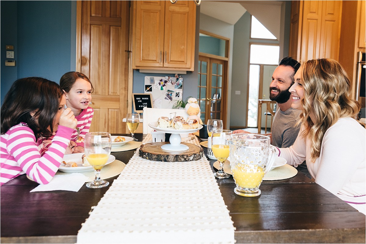 Midwest family eats breakfast during a videography session.