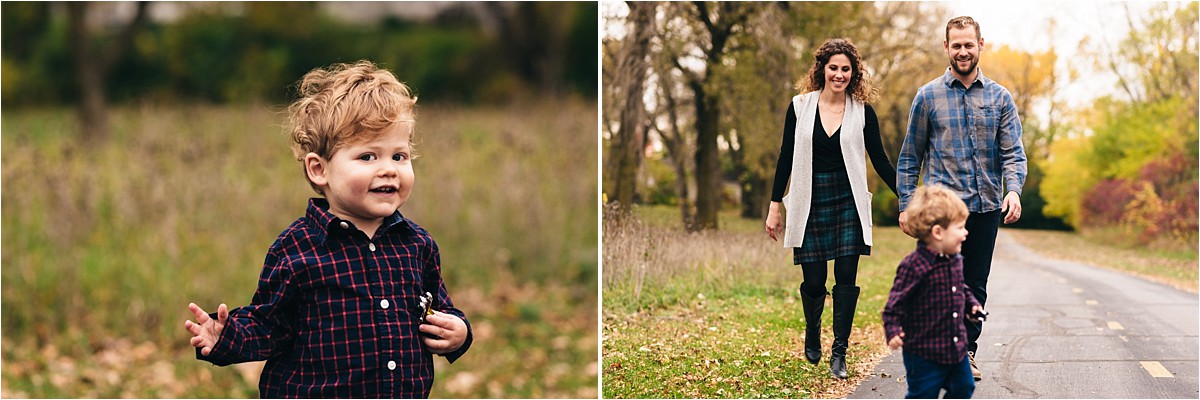 Mother and father walk behind young toddler boy.