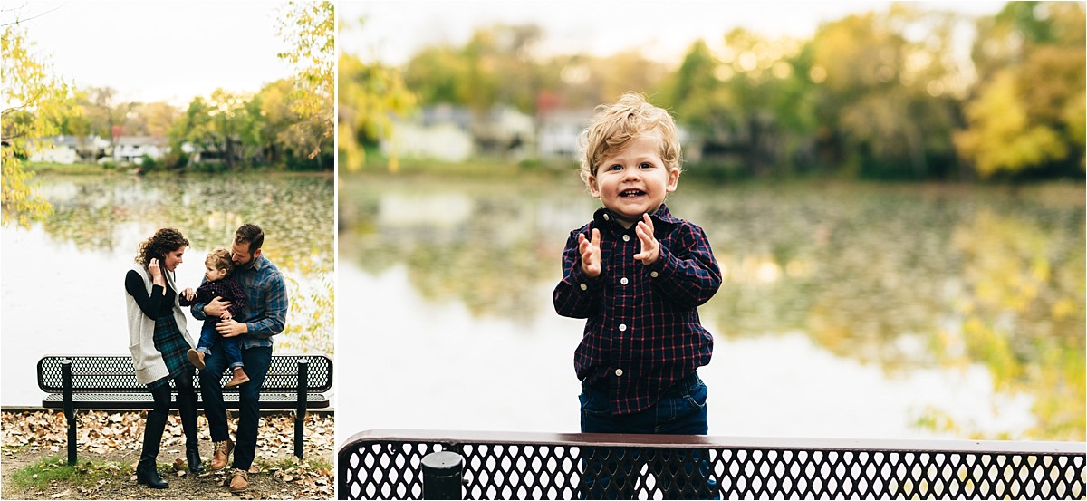 Family of three pose by a lake during a sunset family photography session.