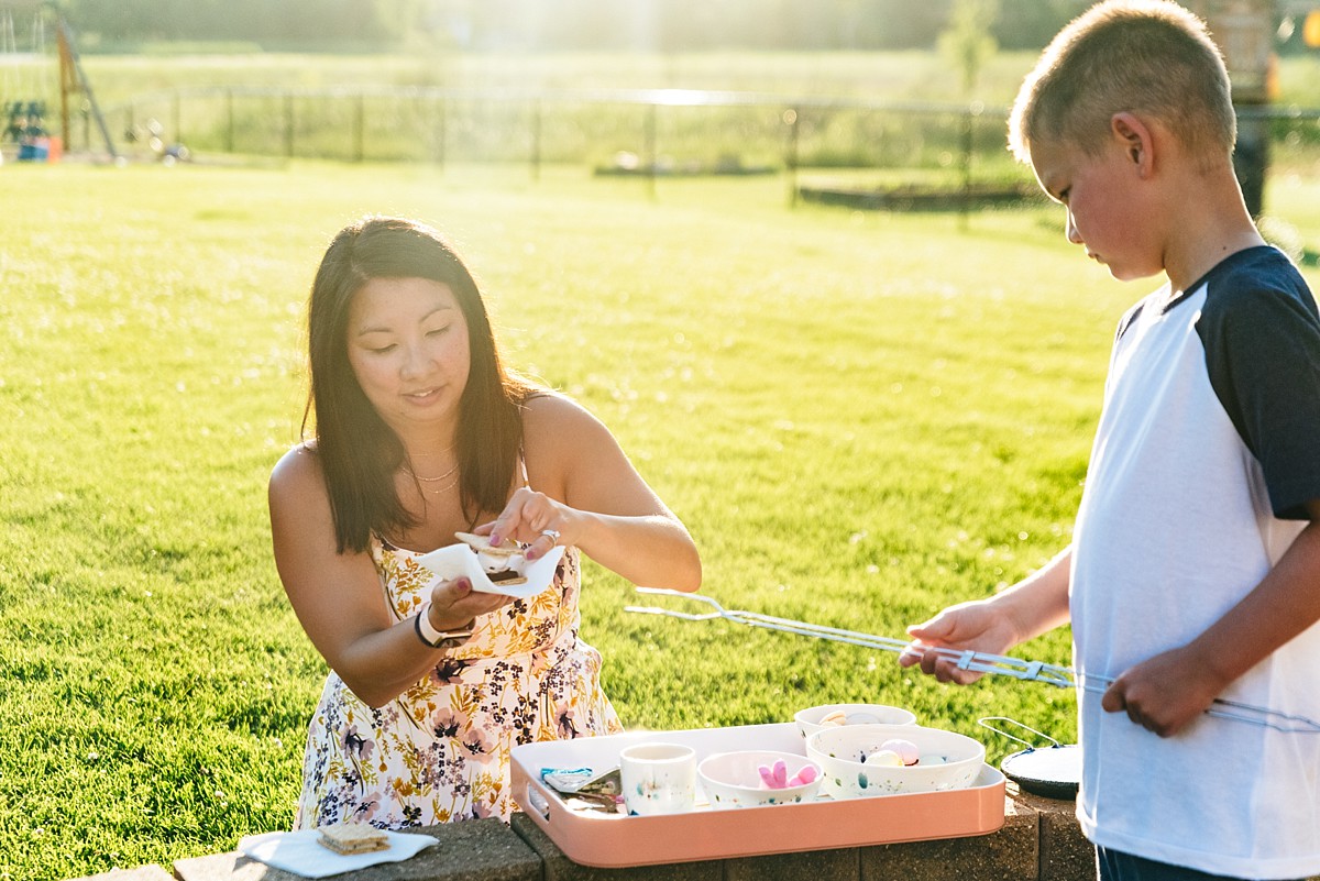 Hugo, MN family enjoys s'mores during photography session.