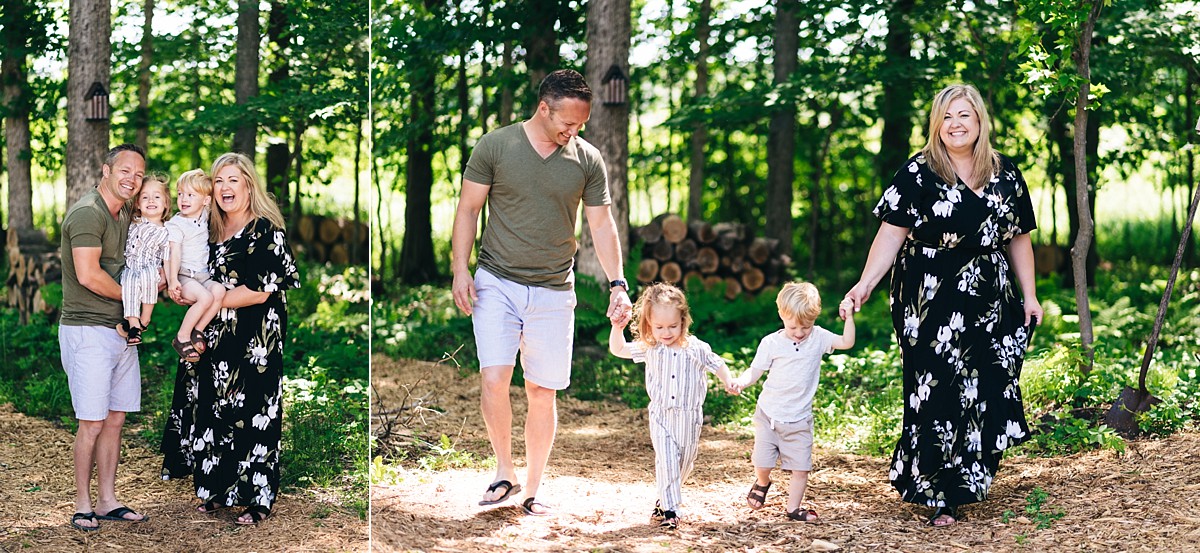 Family of four takes a photo in their yard.