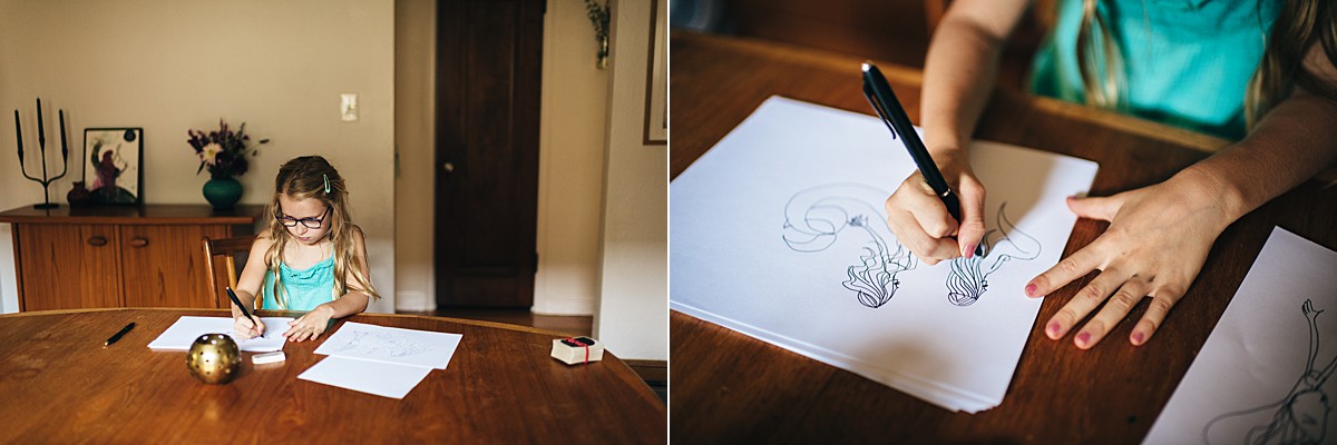 Girl draws at table during Minneapolis family film session.