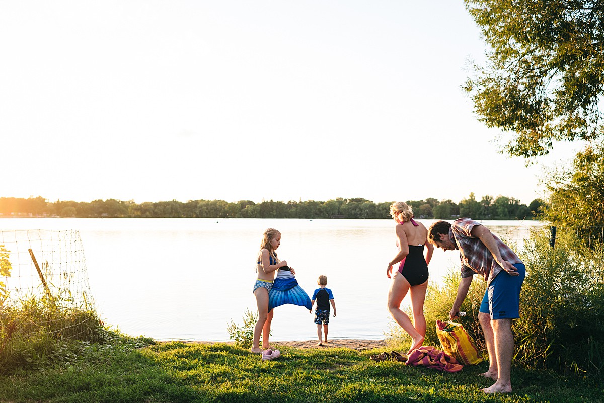 Family prepares to swim in Lake Nokomis in Minneapolis for family film.