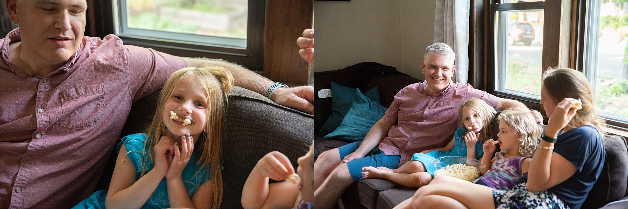 Family of four sits on couch eating popcorn.