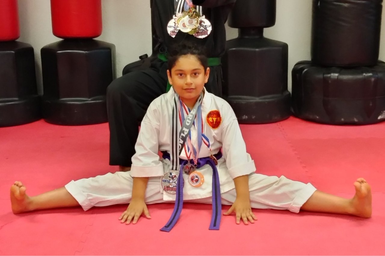 Martial arts instructor with kids