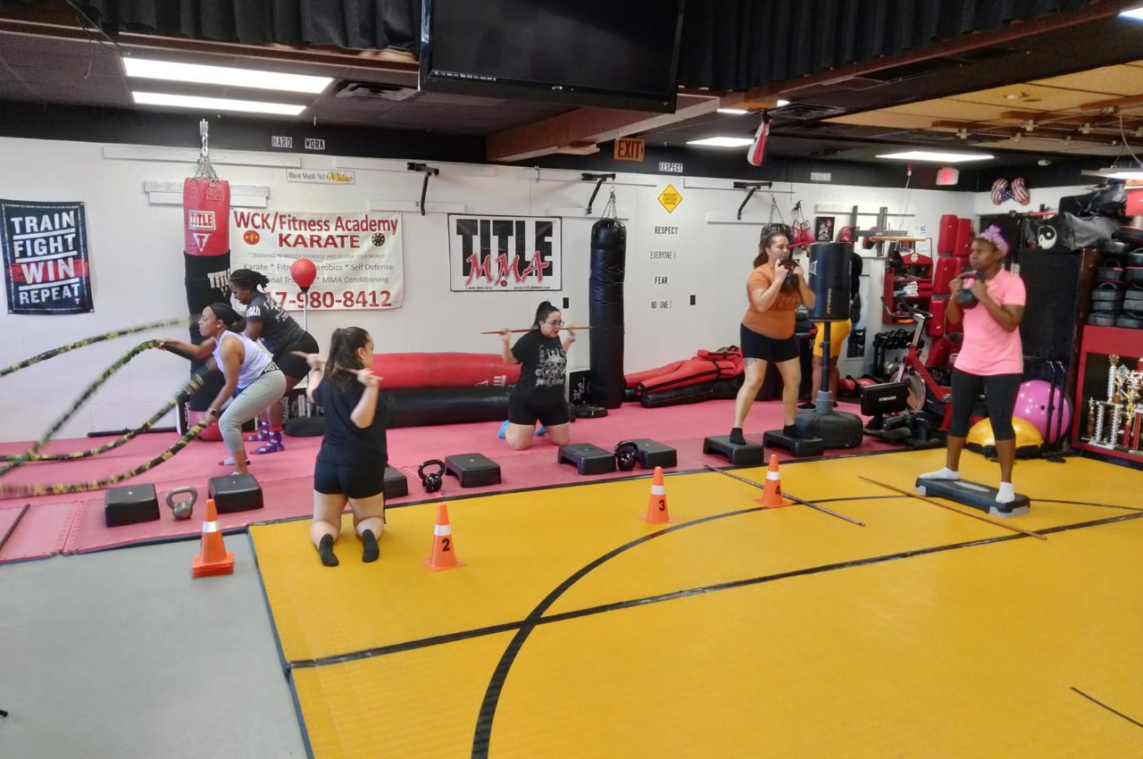 Martial arts instructor with kids