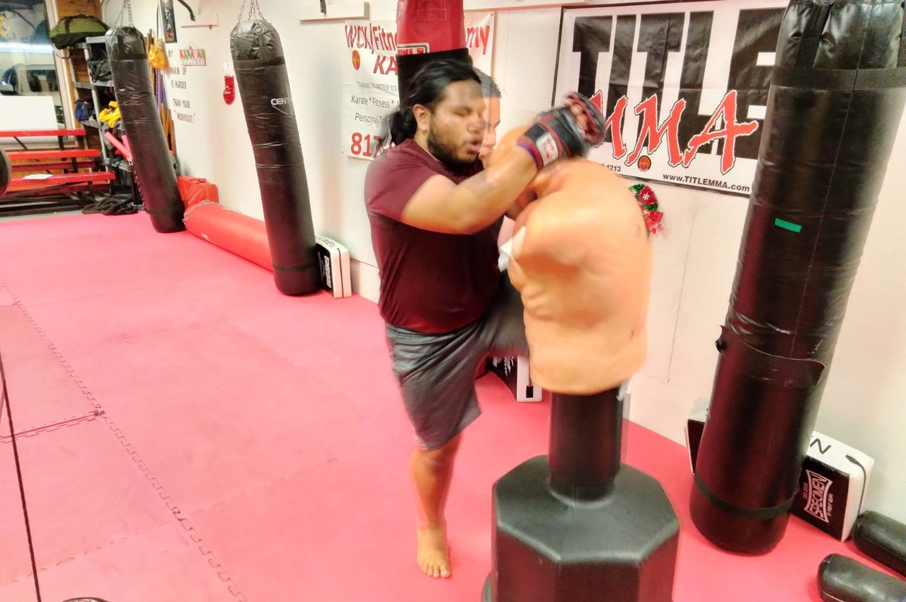 Martial arts instructor with kids